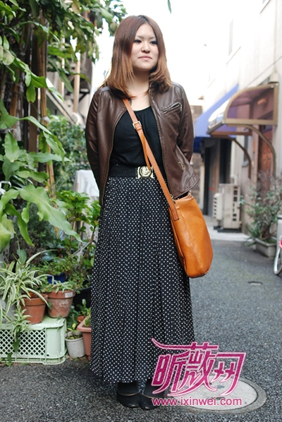 Long dress with matching leather are stylish